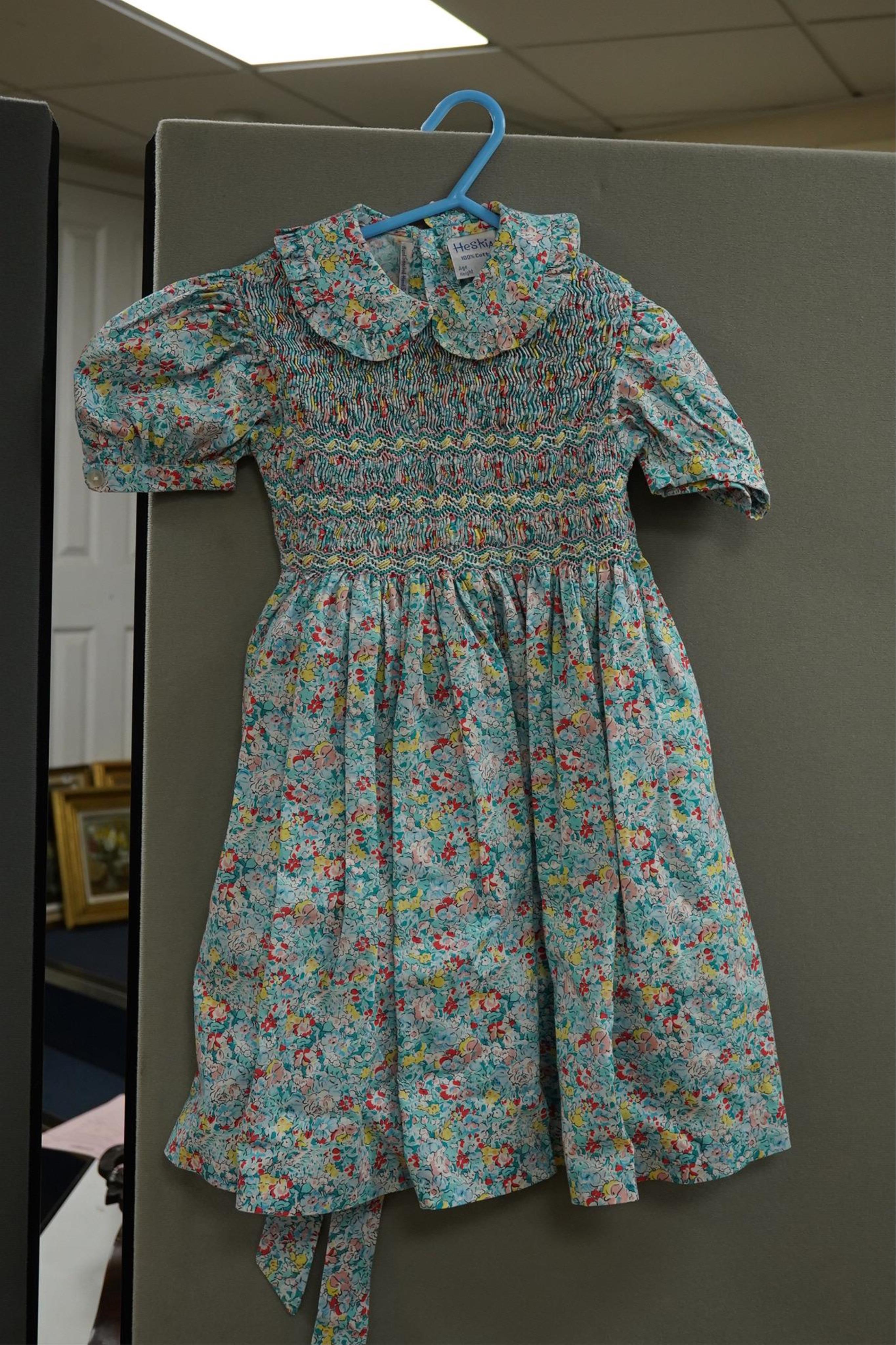 Twelve assorted 1980’s vintage children's dresses up to age eight, some hand smocked to include Harrods Belart, Chantel (including bell in hem), Michael de Leon, Heskia